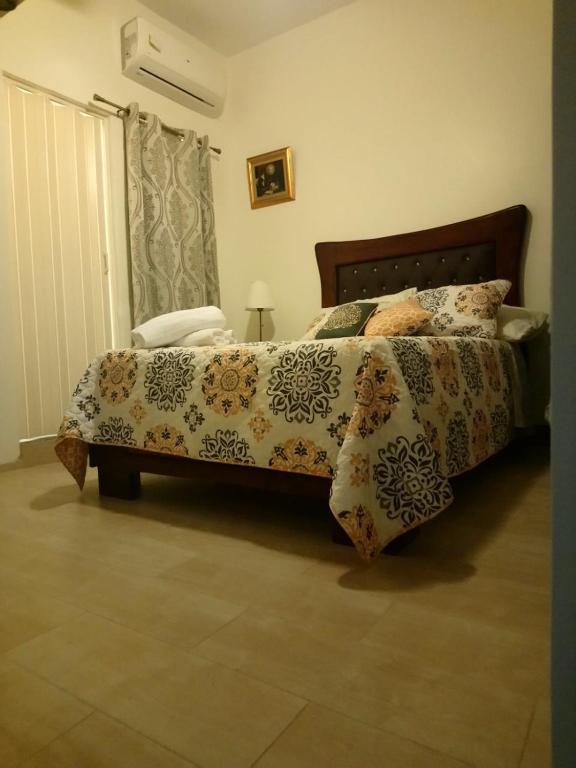 Postel nebo postele na pokoji v ubytování Tavalero Rooms