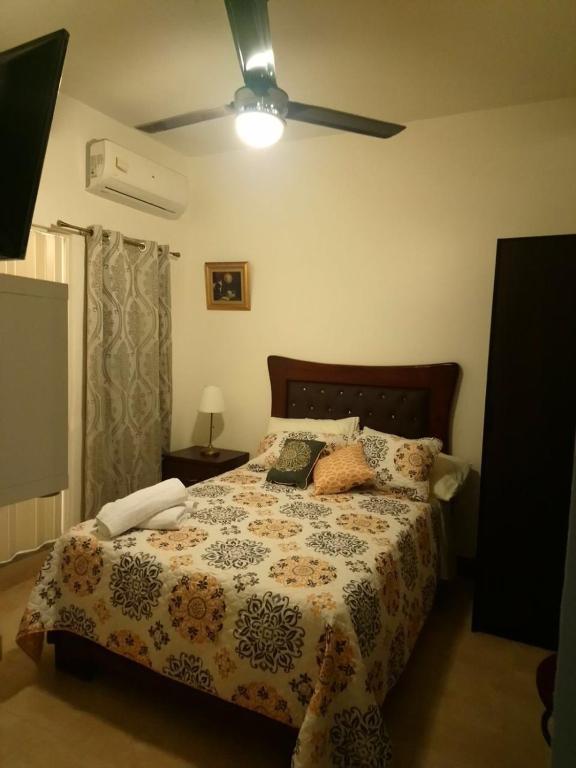 Postel nebo postele na pokoji v ubytování Tavalero Rooms