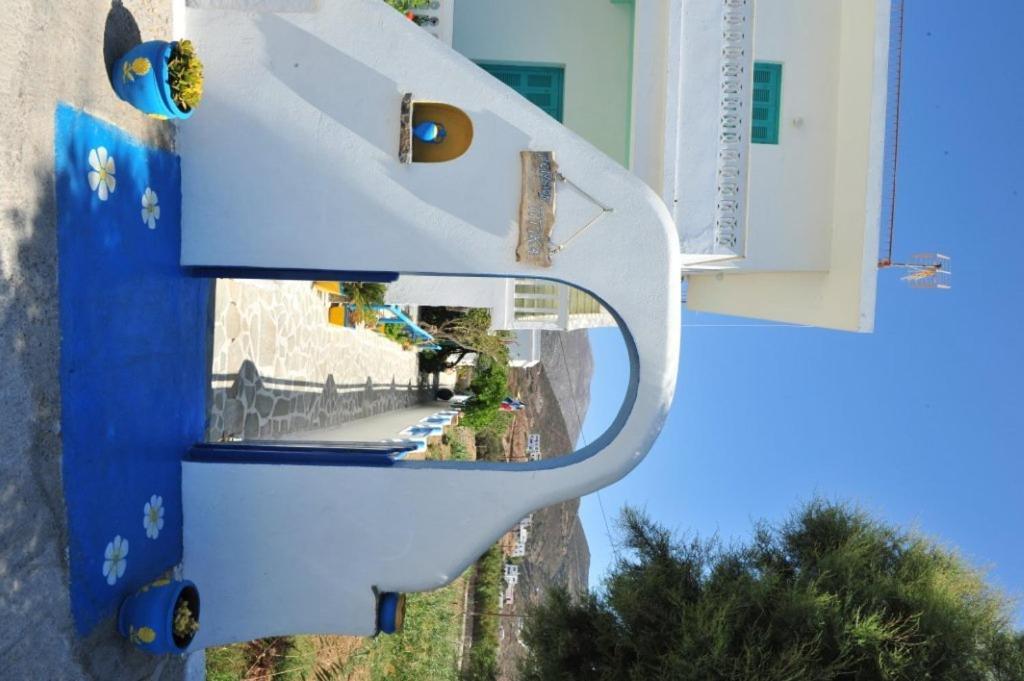 a mirror image of a ride in a roller coaster at Pension Titika in Katapola
