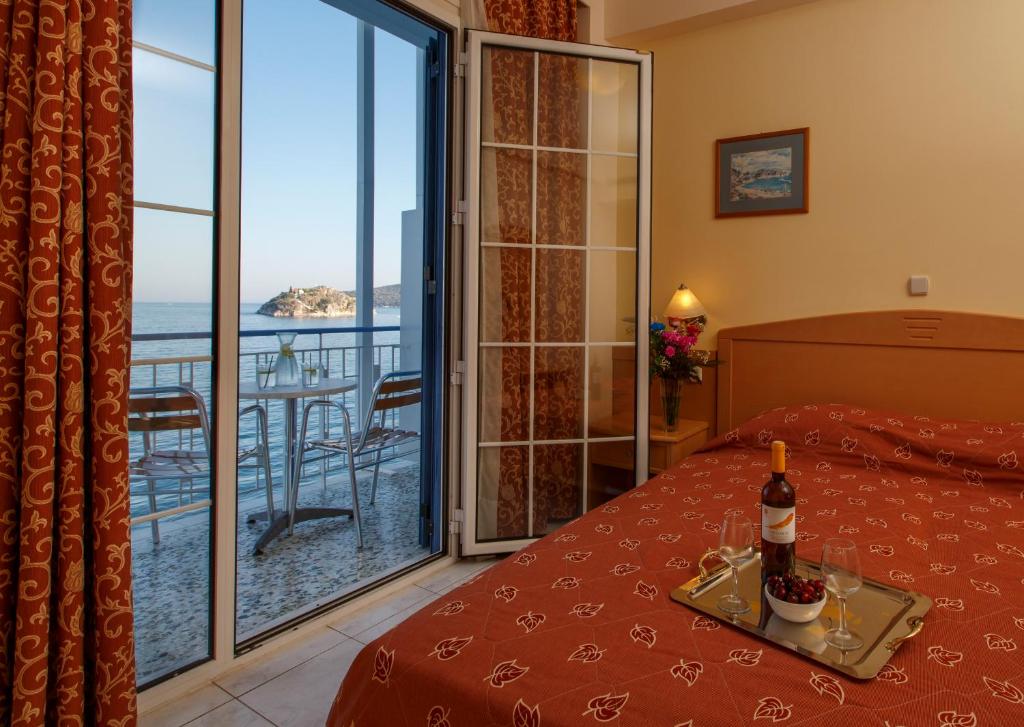 Кровать или кровати в номере Hotel Tolo