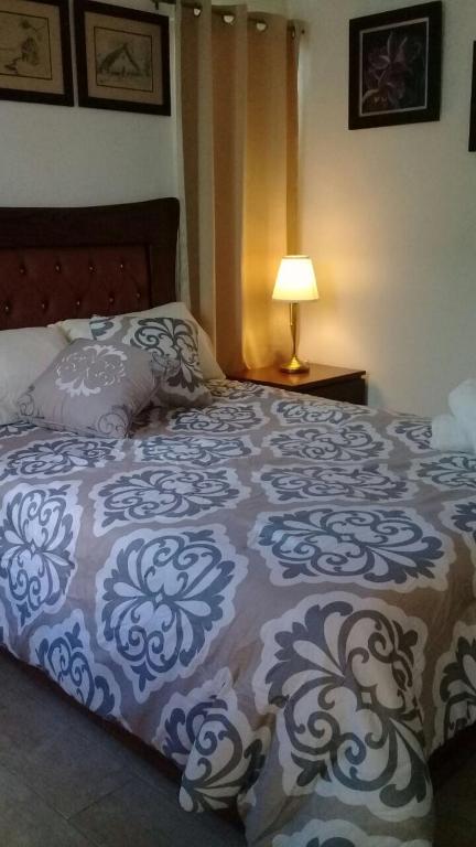 Postel nebo postele na pokoji v ubytování Tavalero Rooms