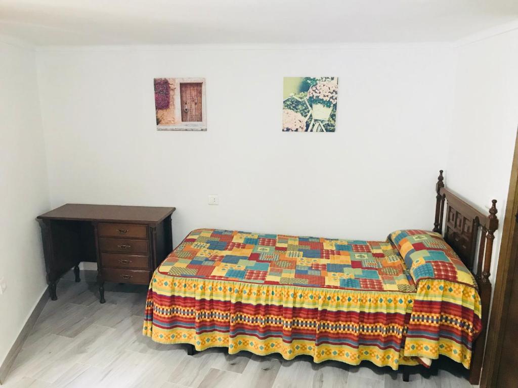 Cama o camas de una habitación en Casa Rural Setenil