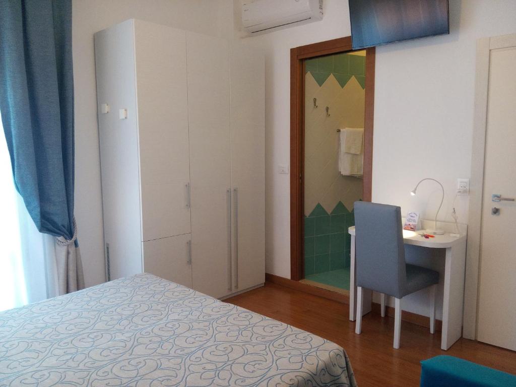Postel nebo postele na pokoji v ubytování Hotel Telenia