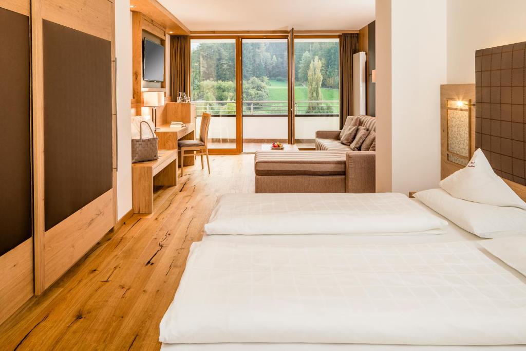 Postel nebo postele na pokoji v ubytování Hotel Kronblick