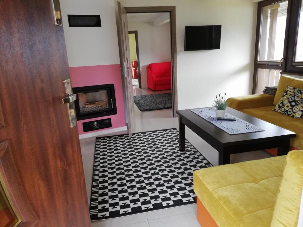 TV a/nebo společenská místnost v ubytování GOLD apartamenty & spa