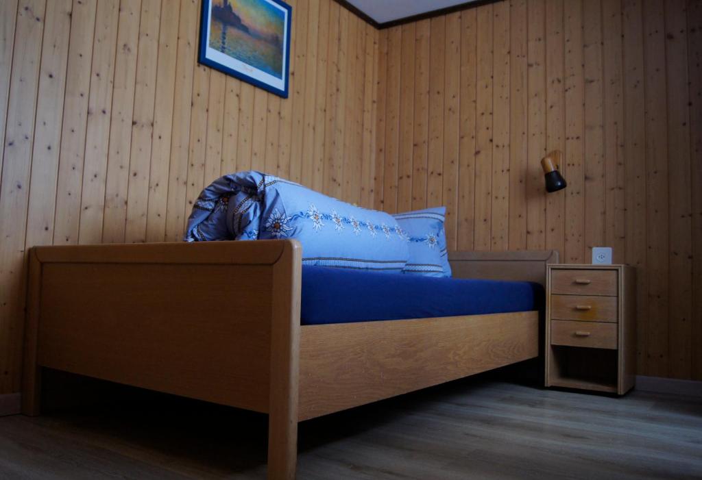 Postel nebo postele na pokoji v ubytování Hotel Alpenblick Muotathal