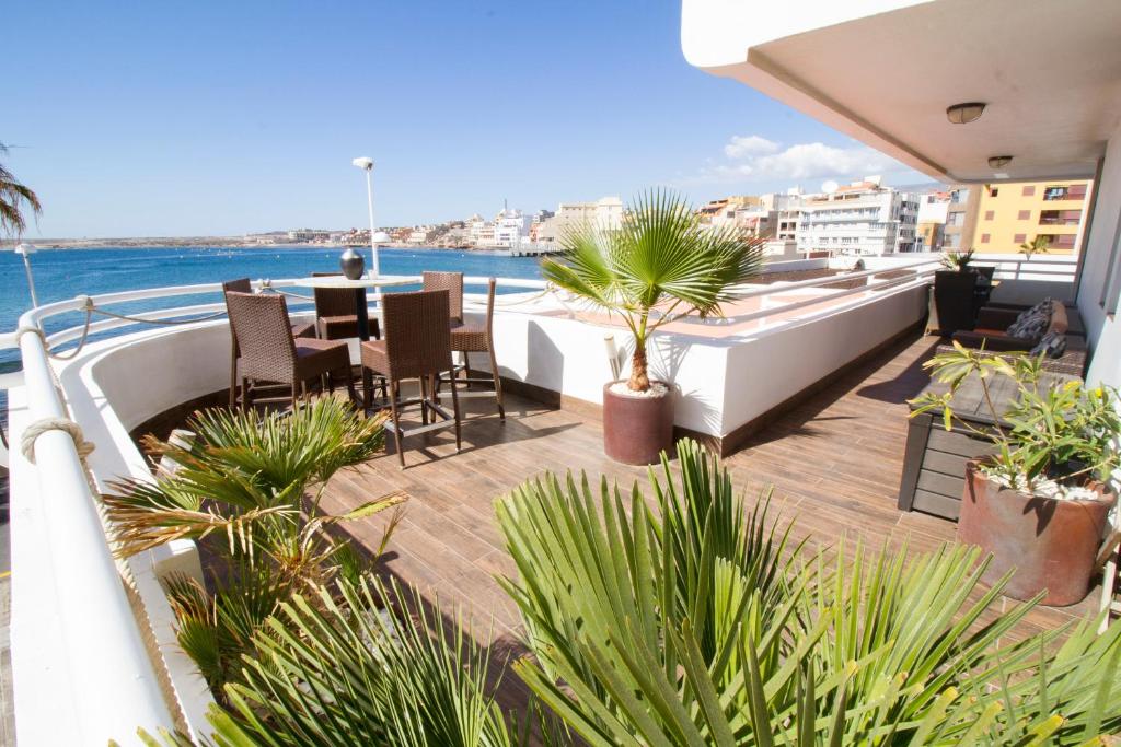 
A balcony or terrace at BEACH-LOFT-NATALIIA - by MEDANO4YOU
