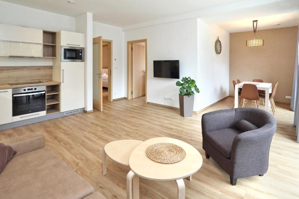 Kuchyň nebo kuchyňský kout v ubytování Apartmány Terasy Café