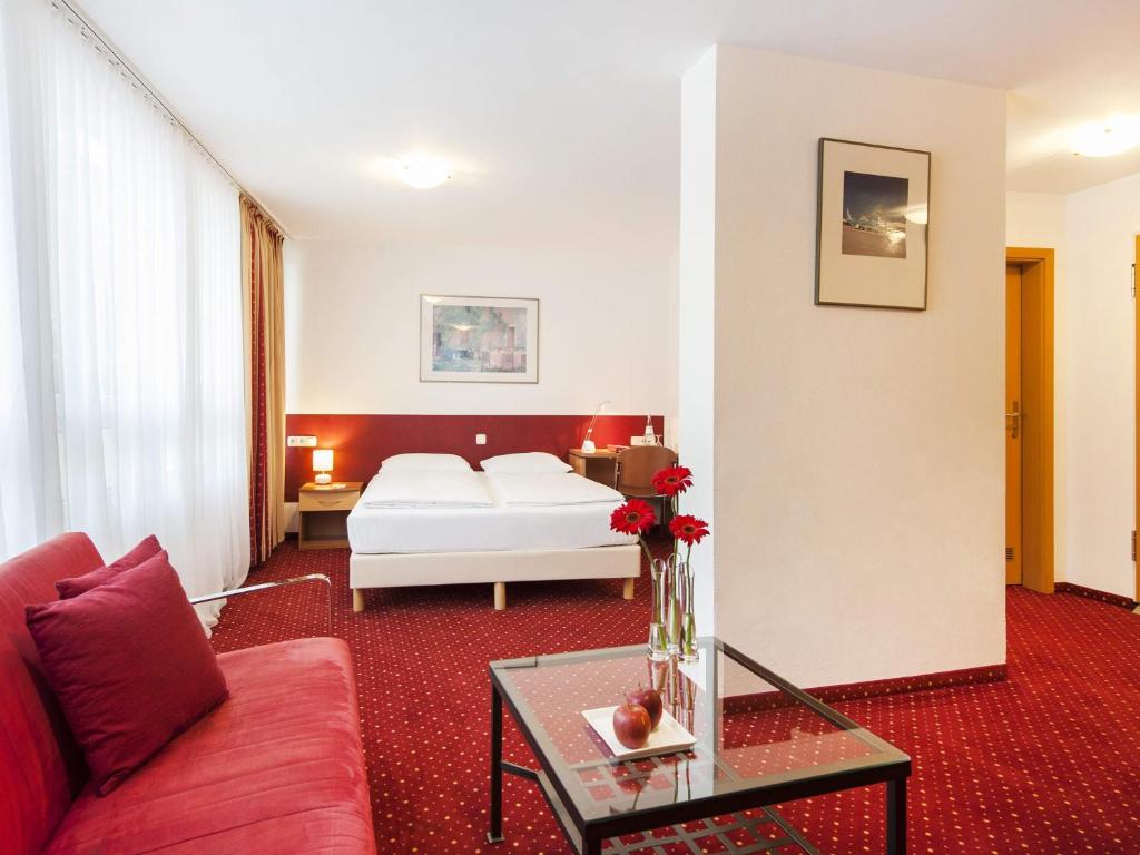 Postel nebo postele na pokoji v ubytování Andante Hotel Erding