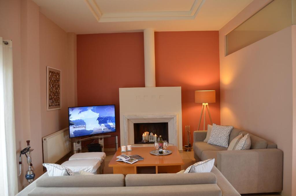 TV a/nebo společenská místnost v ubytování ChaniaStay Central Apartments