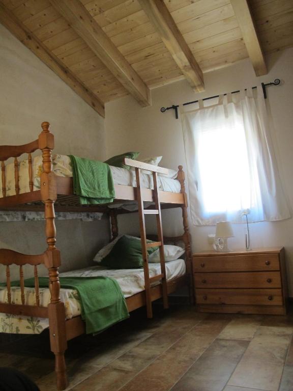 Postel nebo postele na pokoji v ubytování Cal Nenot