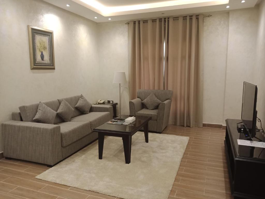 TV a/nebo společenská místnost v ubytování Le Park Hotel