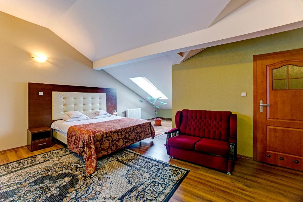 Postel nebo postele na pokoji v ubytování Hotel i Restauracja Bona