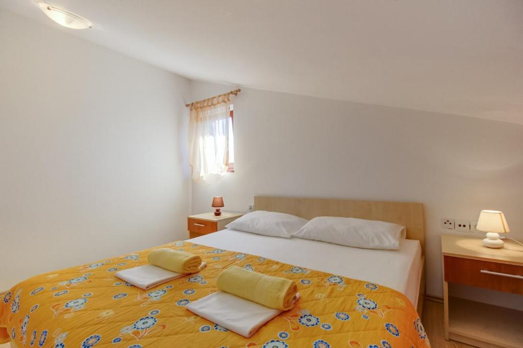 Postel nebo postele na pokoji v ubytování House Prica