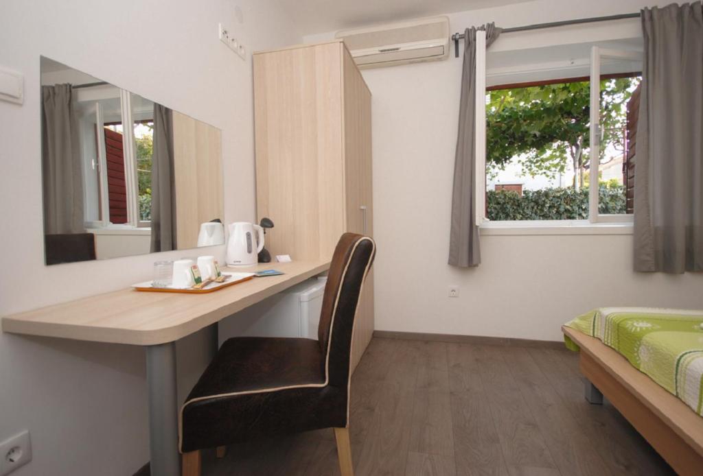 Postel nebo postele na pokoji v ubytování Guesthouse Jet