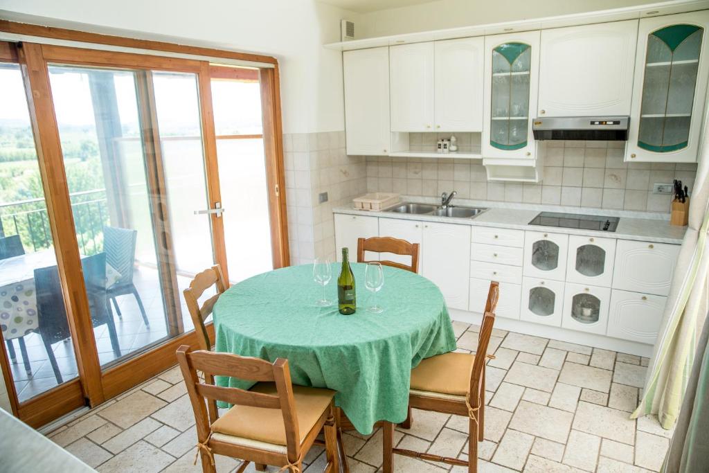 Kuchyň nebo kuchyňský kout v ubytování Zoi Apartments