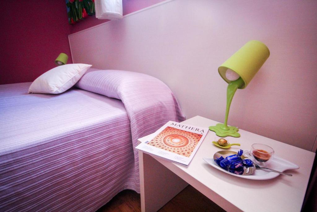 Postel nebo postele na pokoji v ubytování I Tre Fiori