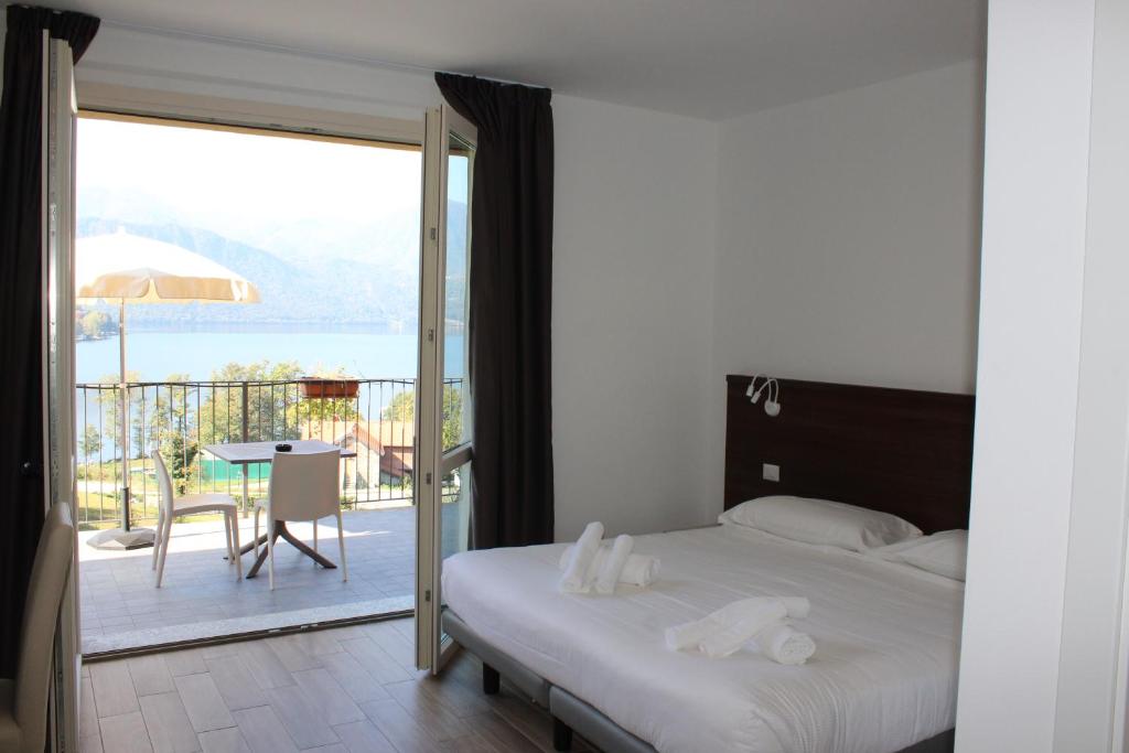Postel nebo postele na pokoji v ubytování Hotel Bocciolo