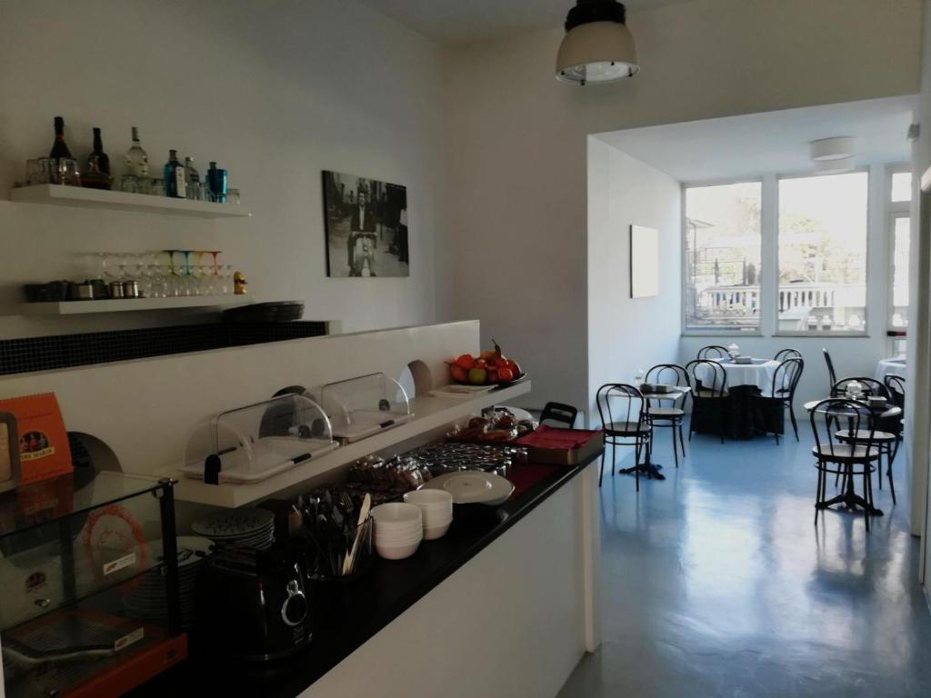 Kuchyň nebo kuchyňský kout v ubytování Hotel Ponte Sassi