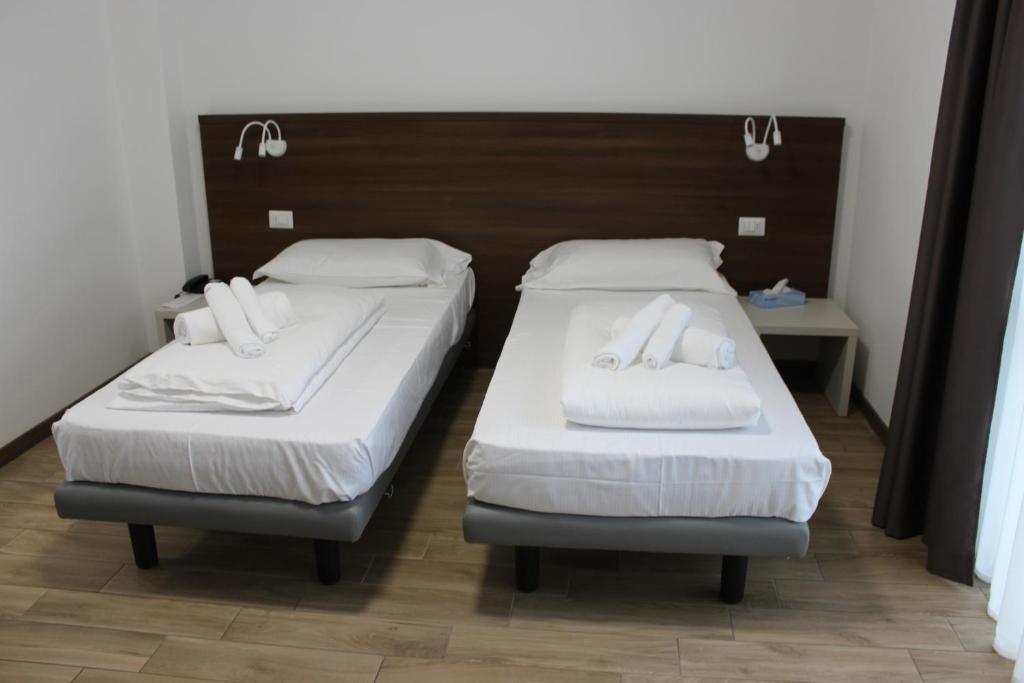 Postel nebo postele na pokoji v ubytování Hotel Bocciolo