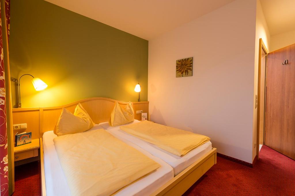 Posteľ alebo postele v izbe v ubytovaní Hotel Domittner