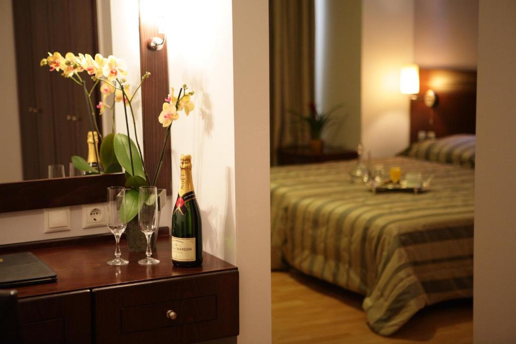 Postel nebo postele na pokoji v ubytování Flisvos Hotel Nafpaktos