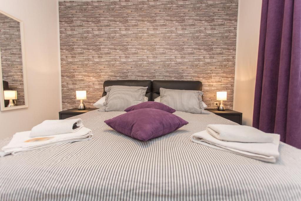 Posteľ alebo postele v izbe v ubytovaní Apartments Villa Sol