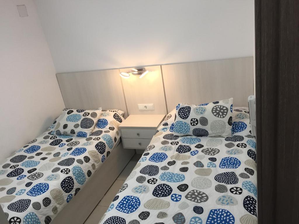 Postel nebo postele na pokoji v ubytování First line Apartment