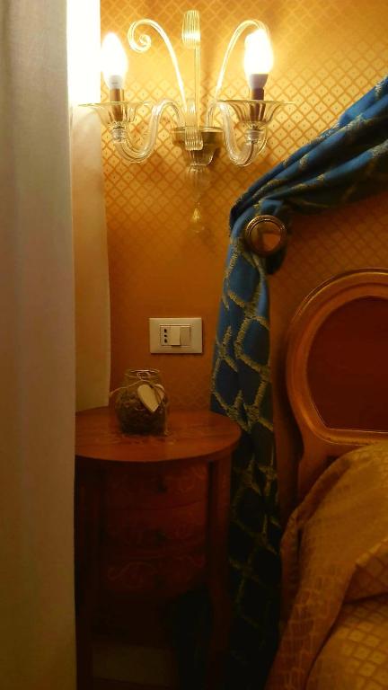 Postel nebo postele na pokoji v ubytování Hotel Locanda Canal