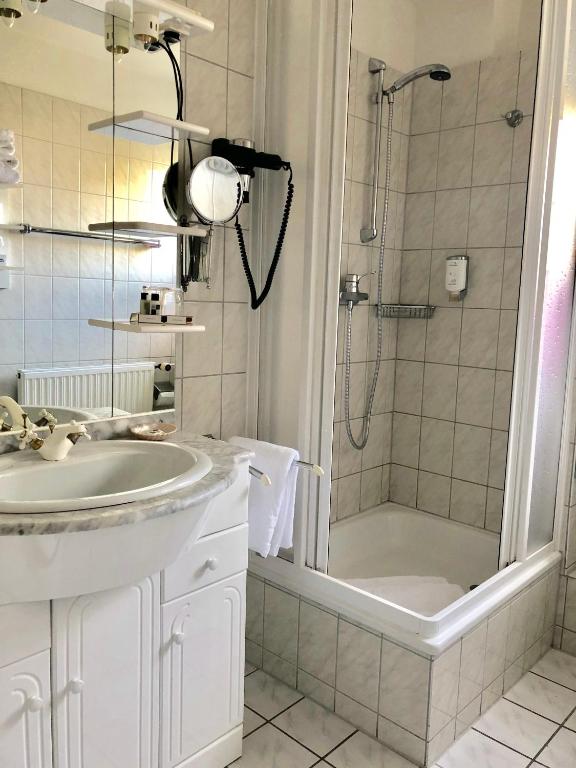 Koupelna v ubytování Hotel Sylter Blaumuschel