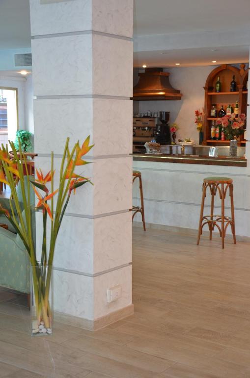 Kuchyň nebo kuchyňský kout v ubytování Hotel Rosen Garden