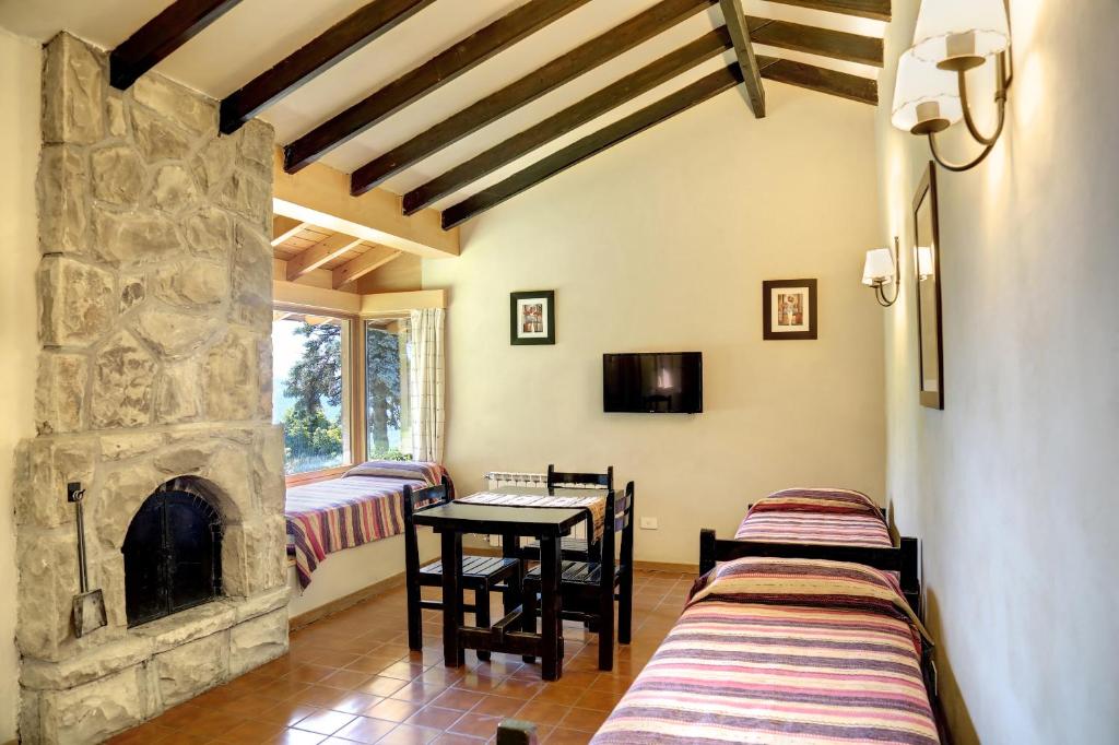 Postel nebo postele na pokoji v ubytování La Caleta Bungalows