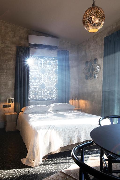 Postel nebo postele na pokoji v ubytování Hoeve La Cascina