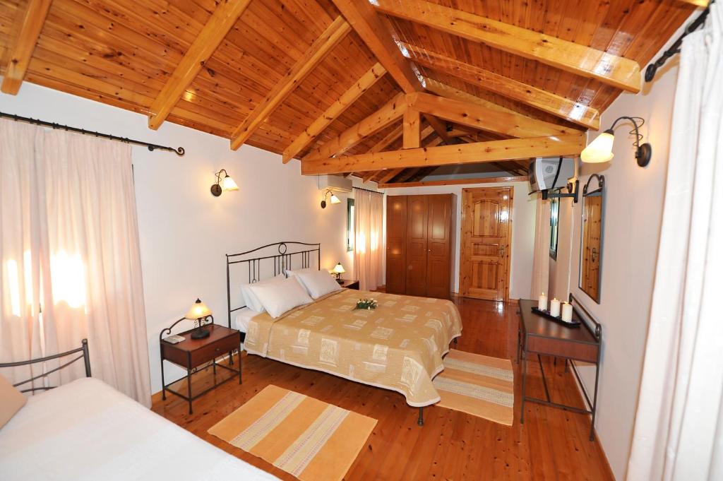 A bed or beds in a room at Pieros Studios Lisipios