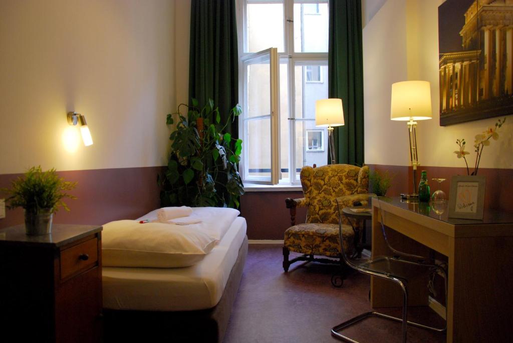 Postel nebo postele na pokoji v ubytování Grand Hostel Berlin Classic