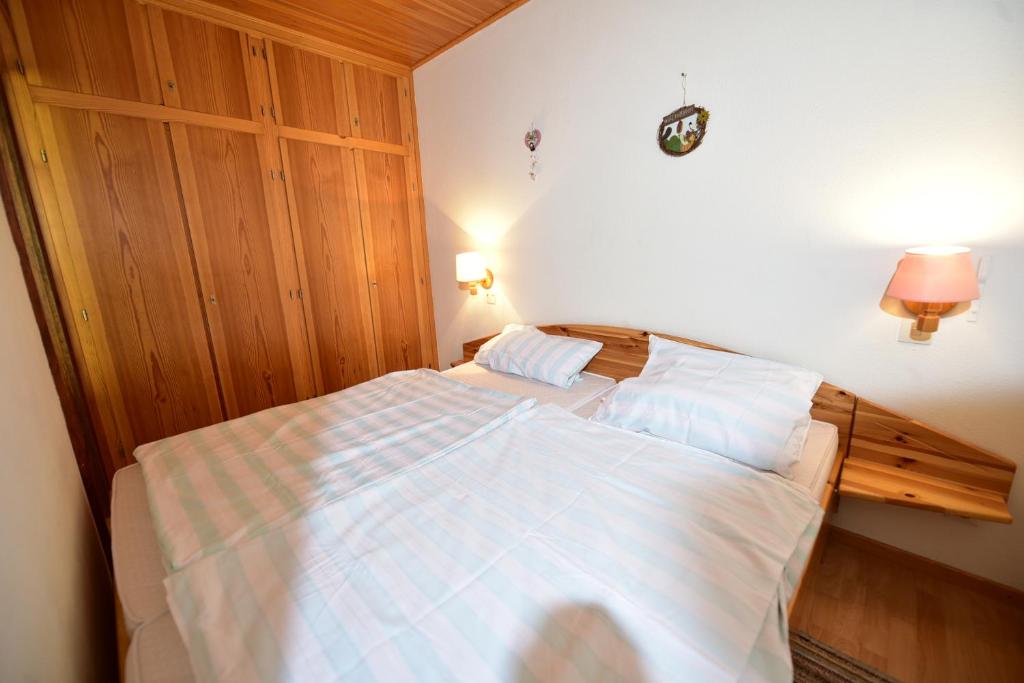 Postel nebo postele na pokoji v ubytování Jasmin