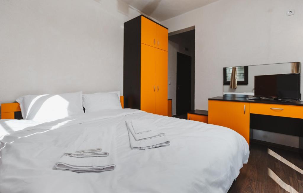 Postel nebo postele na pokoji v ubytování Zlatograd 2 Iosifova Guest House