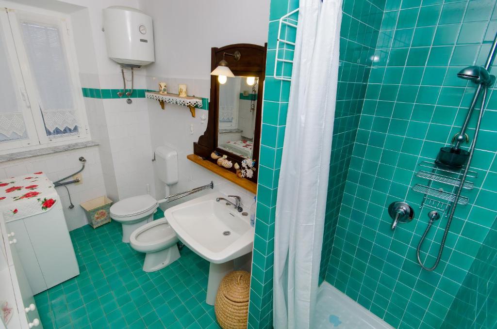 Koupelna v ubytování Casa Paola