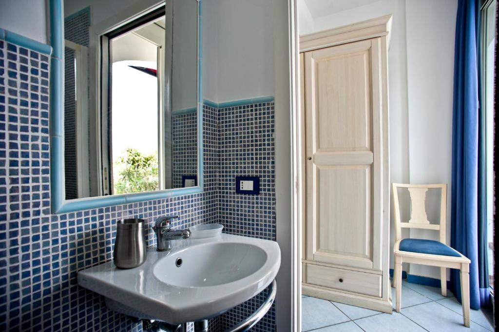 Koupelna v ubytování Hotel Villa Iulia