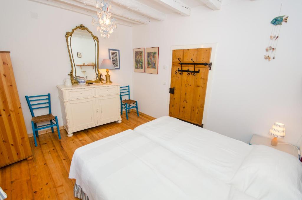 Postel nebo postele na pokoji v ubytování Casa Paola