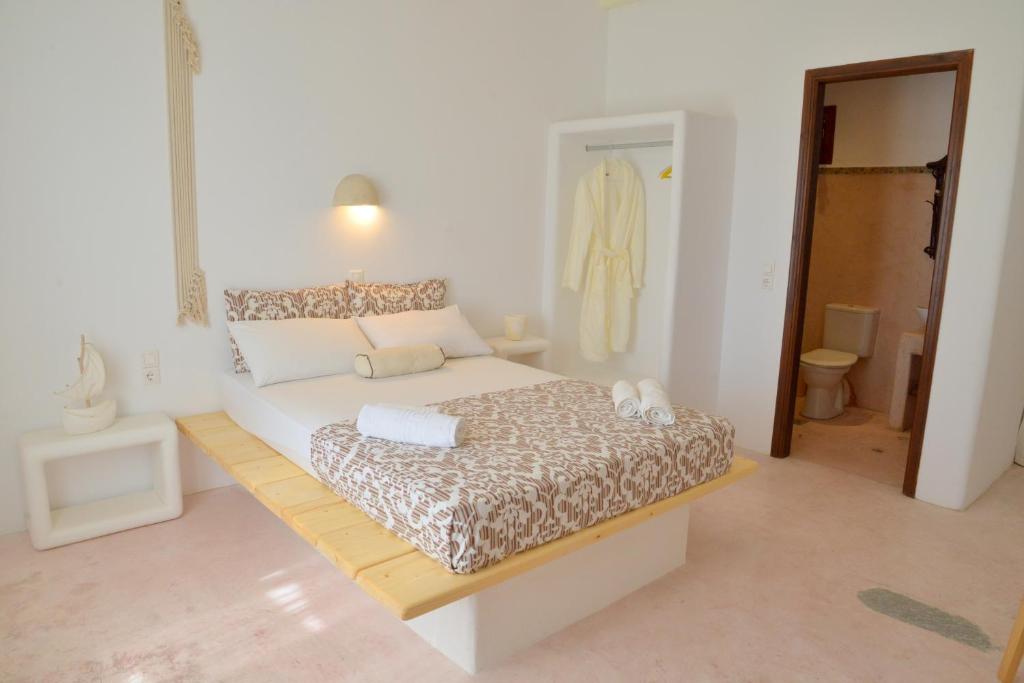 Postel nebo postele na pokoji v ubytování Fantasy Rooms