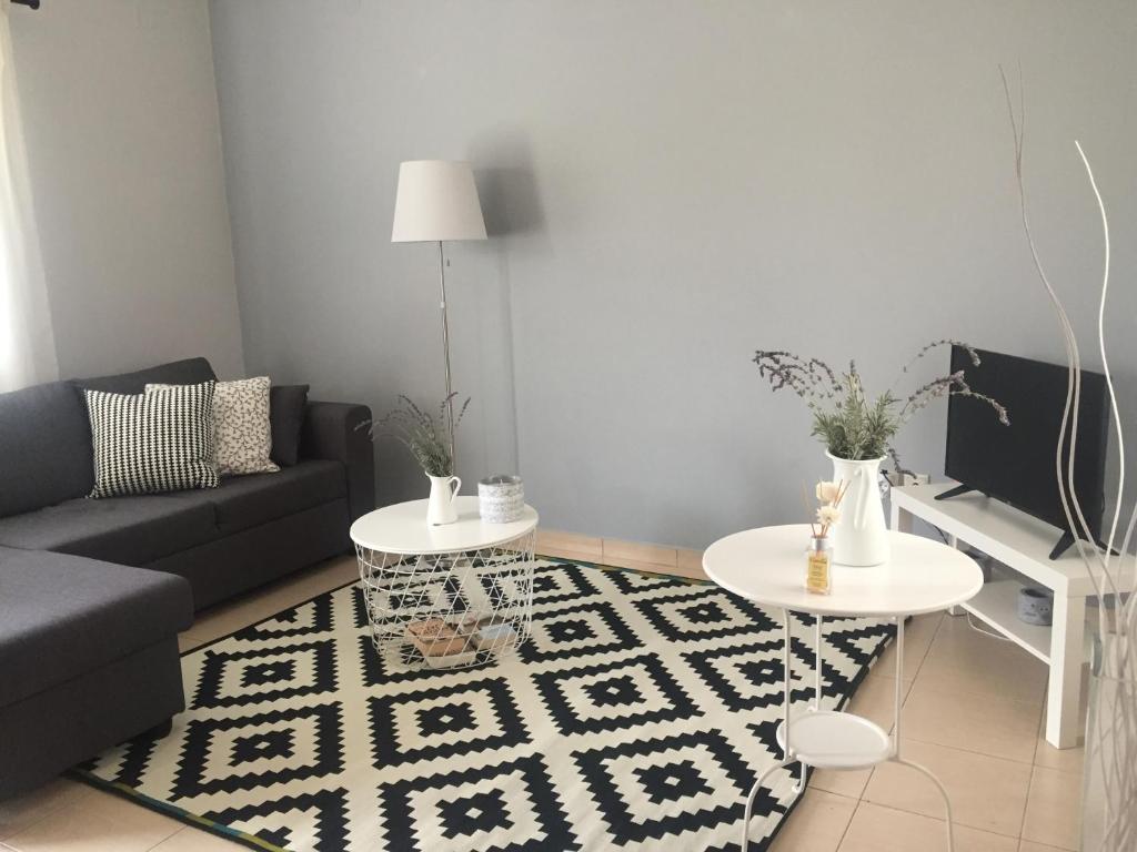 TV a/nebo společenská místnost v ubytování Helianthus Apartments