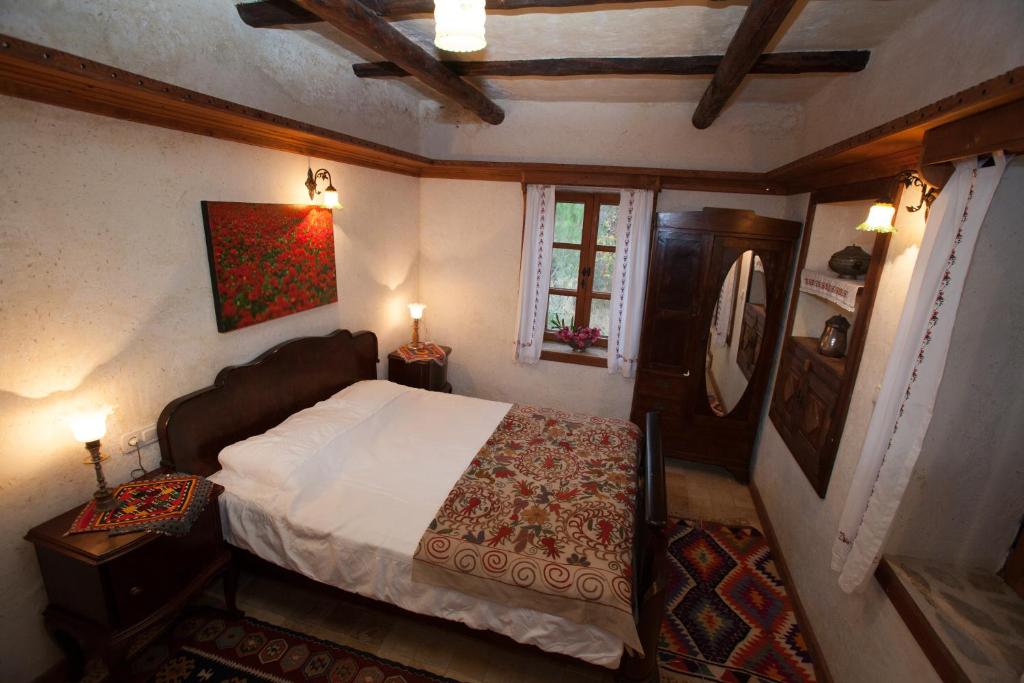 Postel nebo postele na pokoji v ubytování Hoyran Wedre Country Houses