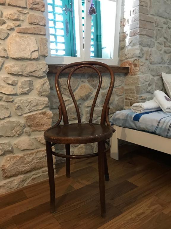 Postel nebo postele na pokoji v ubytování Karla