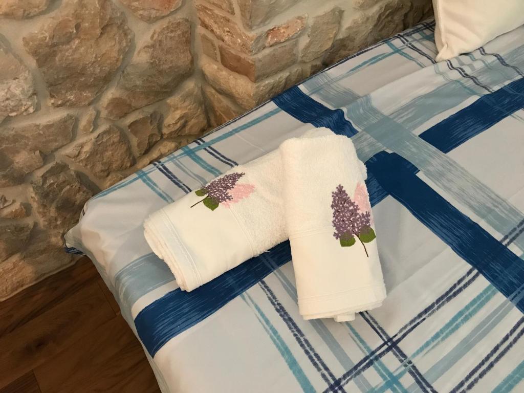 Postel nebo postele na pokoji v ubytování Karla