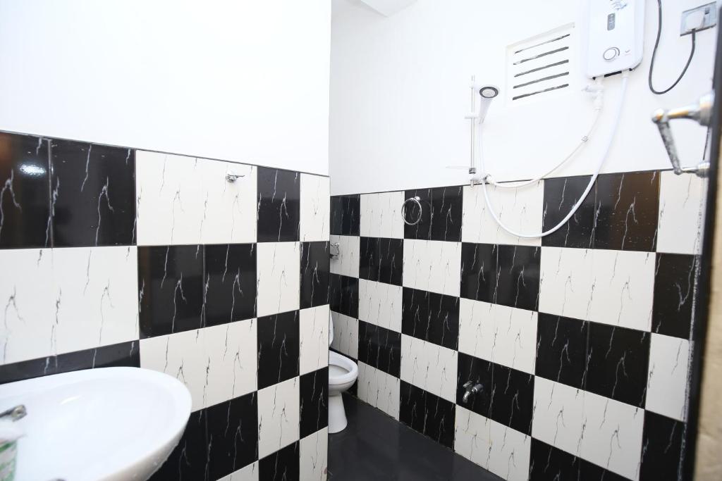 Koupelna v ubytování Isuru Homestay
