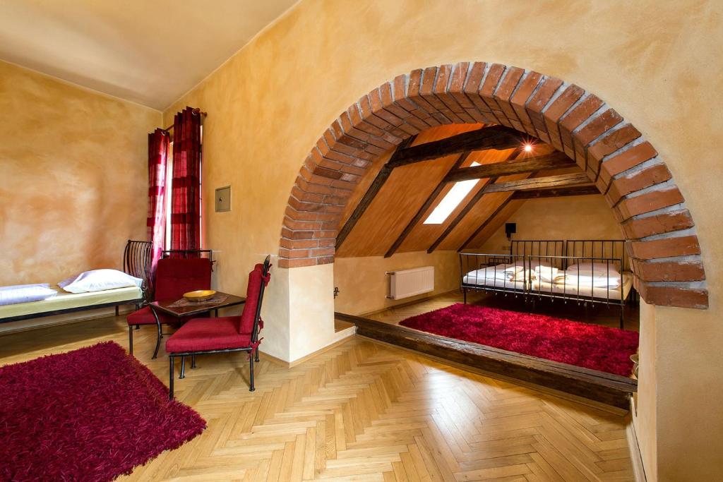 Postel nebo postele na pokoji v ubytování Arcadie Hotel & Apartments