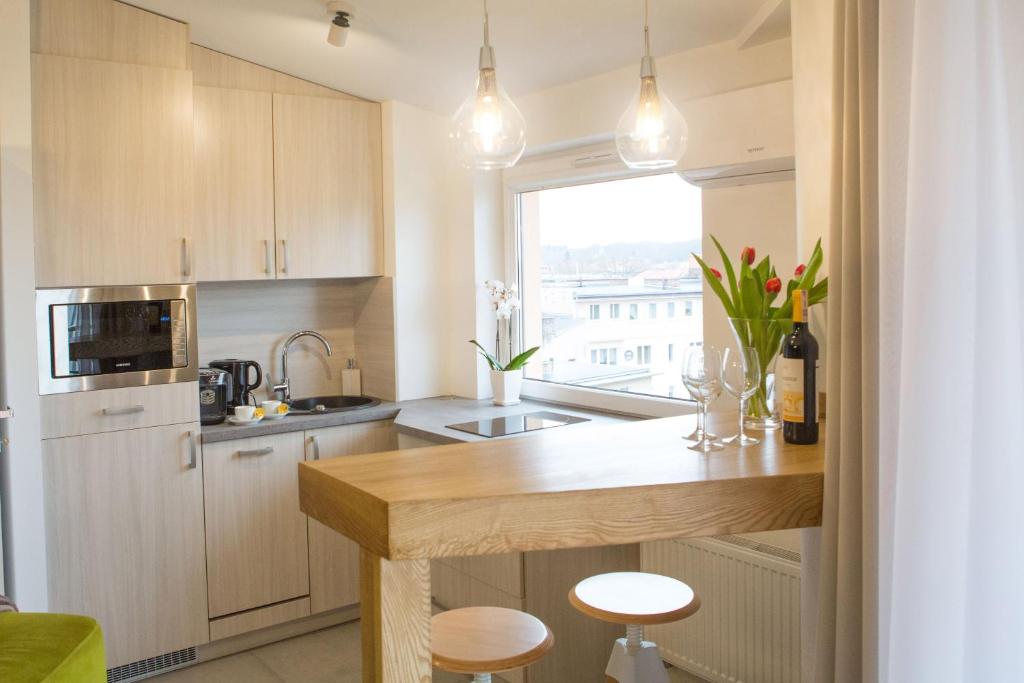 Kuchyňa alebo kuchynka v ubytovaní Apartamenty Centrum