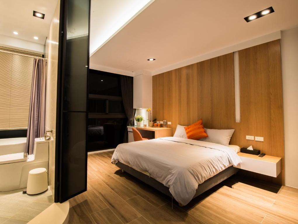 Postel nebo postele na pokoji v ubytování Galilee B&B 加利利海民宿