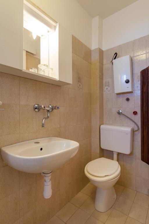 Koupelna v ubytování Rooms Marinac